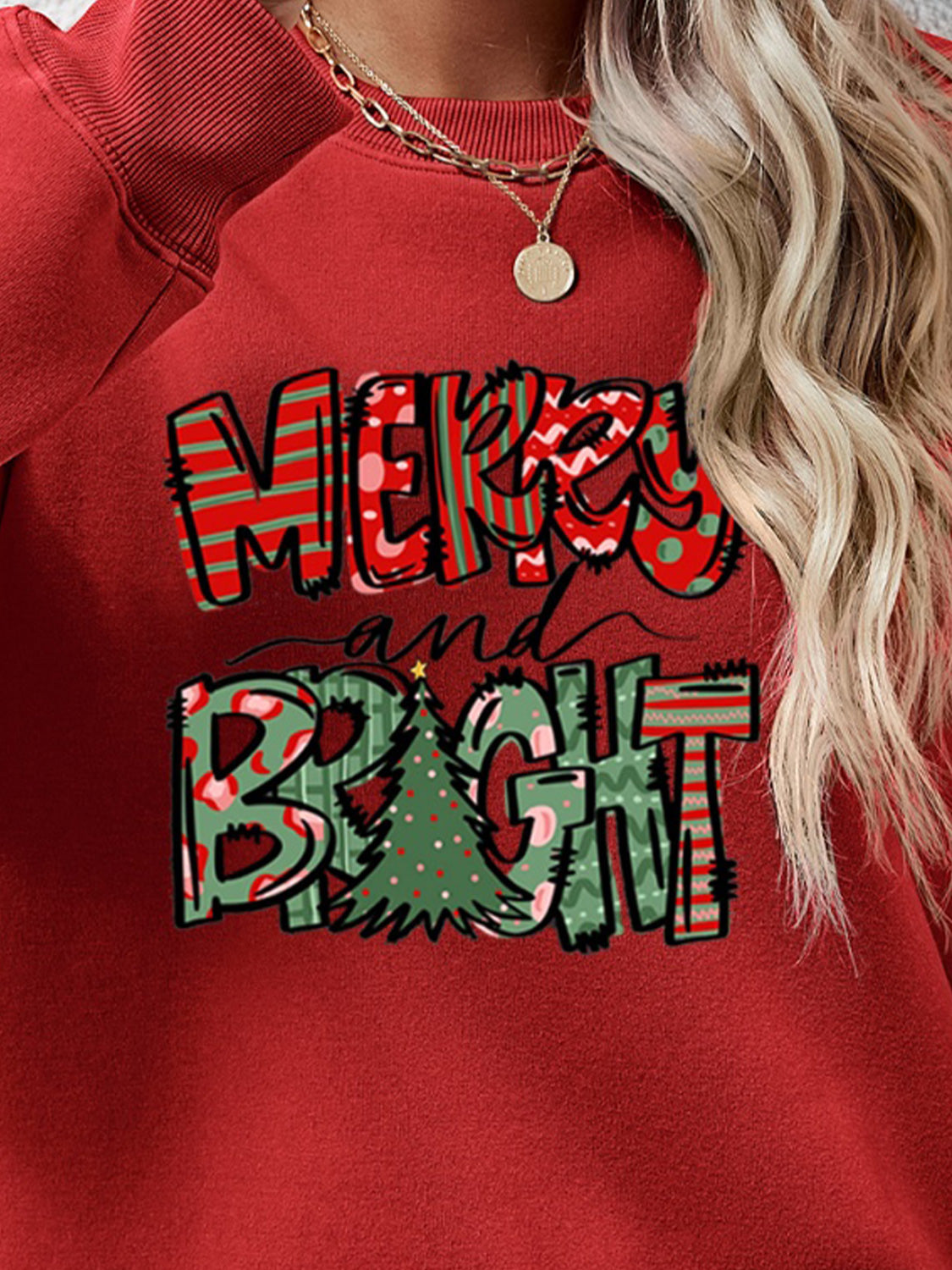 Festive ‘MERRY AND BRIGHT’ long sleeve sweatshirt, perfect for holiday cheer and cozy style.