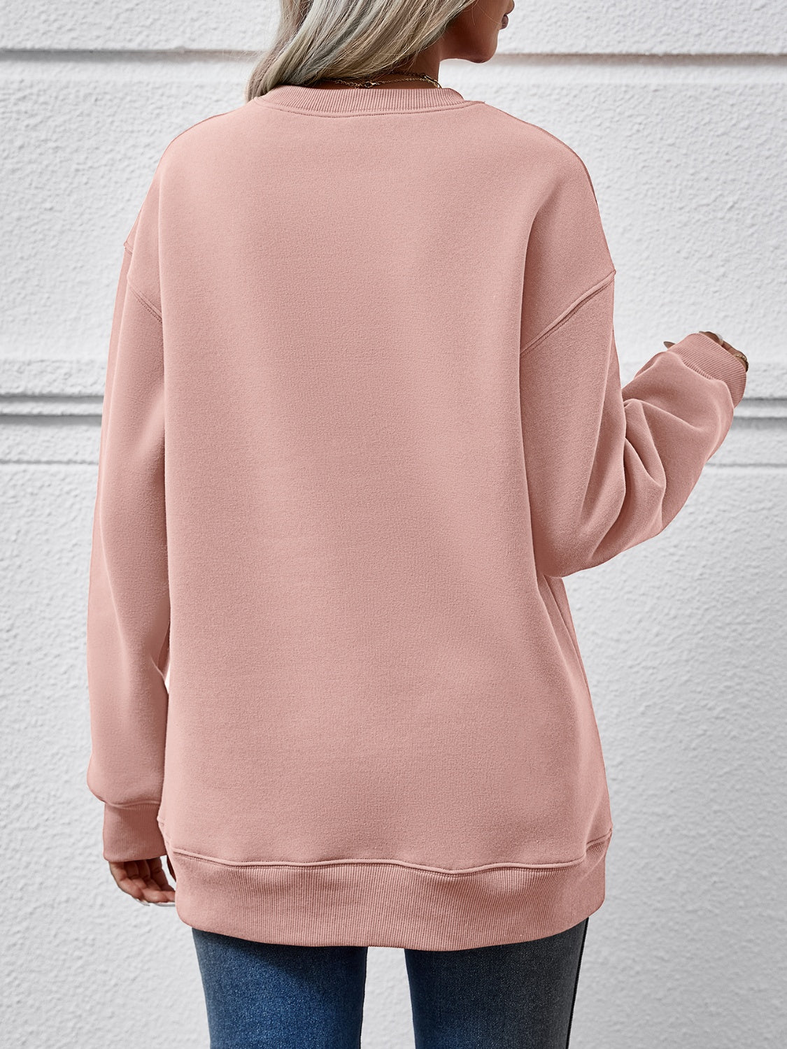 Festive ‘MERRY AND BRIGHT’ long sleeve sweatshirt, perfect for holiday cheer and cozy style.