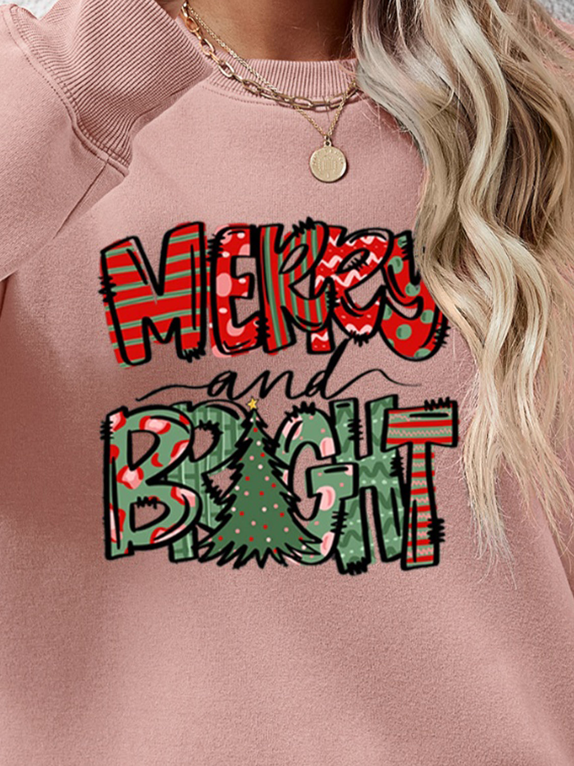 Festive ‘MERRY AND BRIGHT’ long sleeve sweatshirt, perfect for holiday cheer and cozy style.