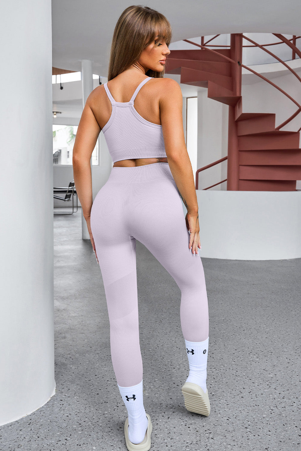 Stylish tank cropped active top and pants set, designed for comfort and a sporty, chic look.