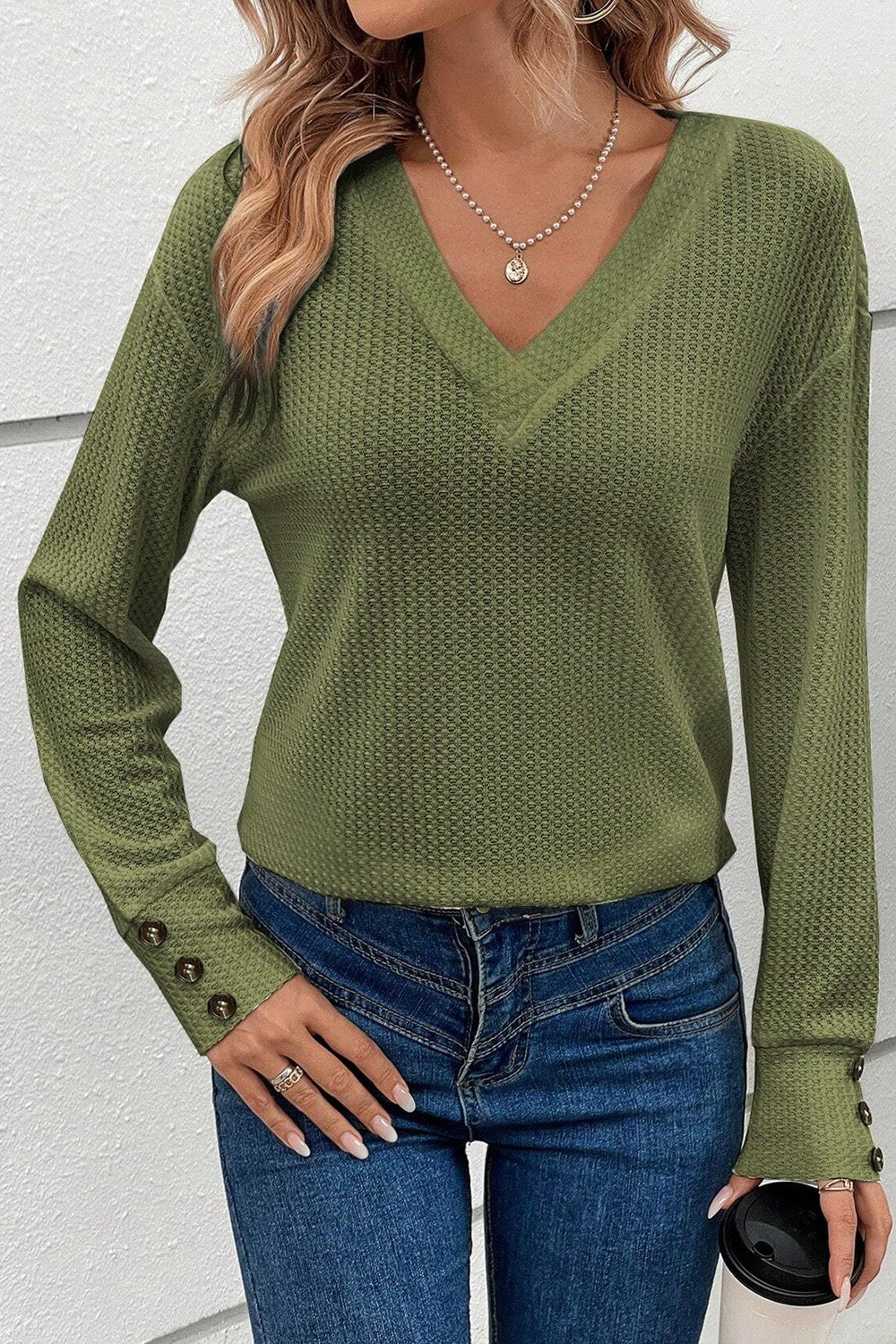 Trendy and stylish top designed for casual and chic looks.