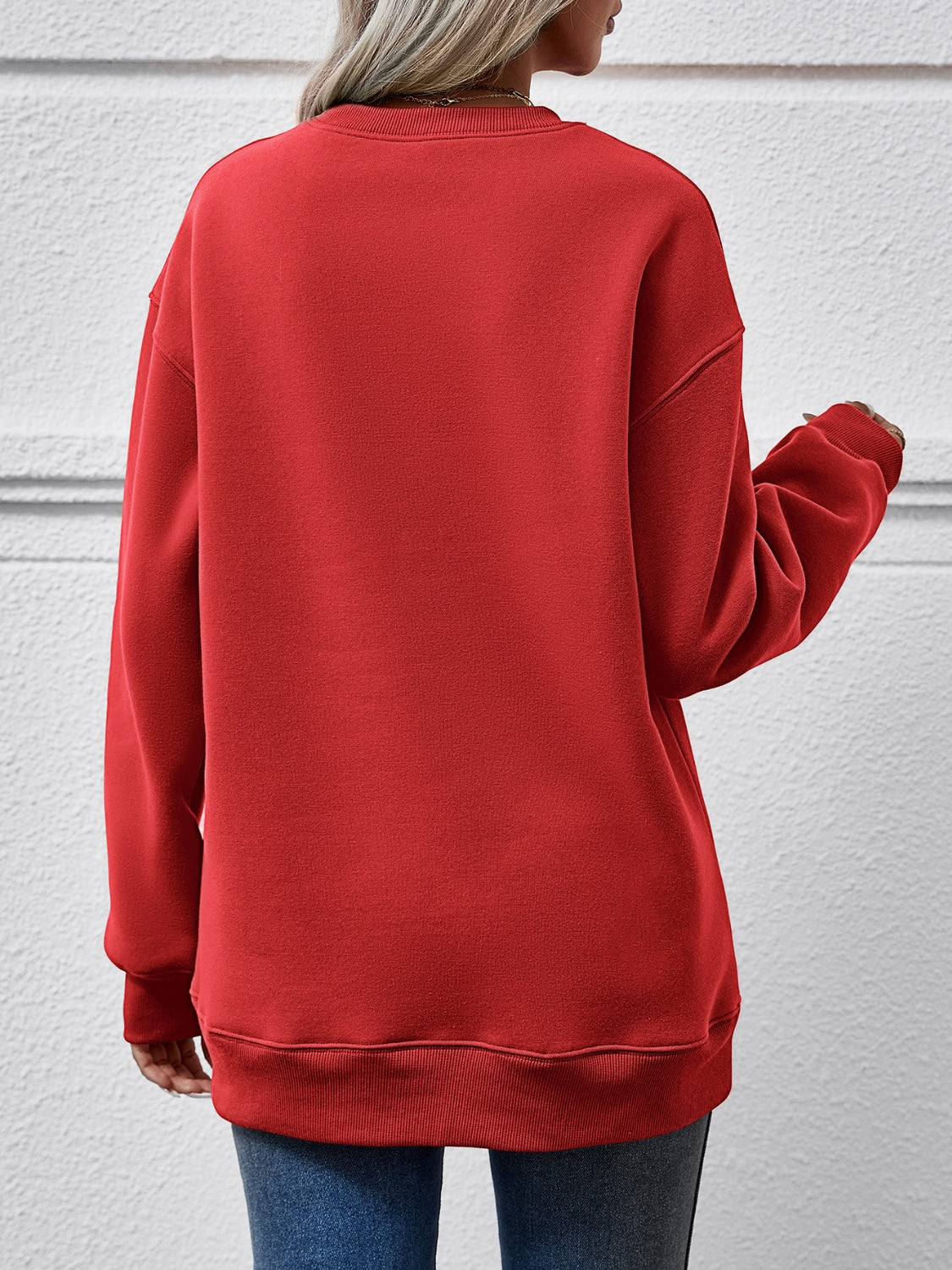 Festive ‘MERRY AND BRIGHT’ long sleeve sweatshirt, perfect for holiday cheer and cozy style.