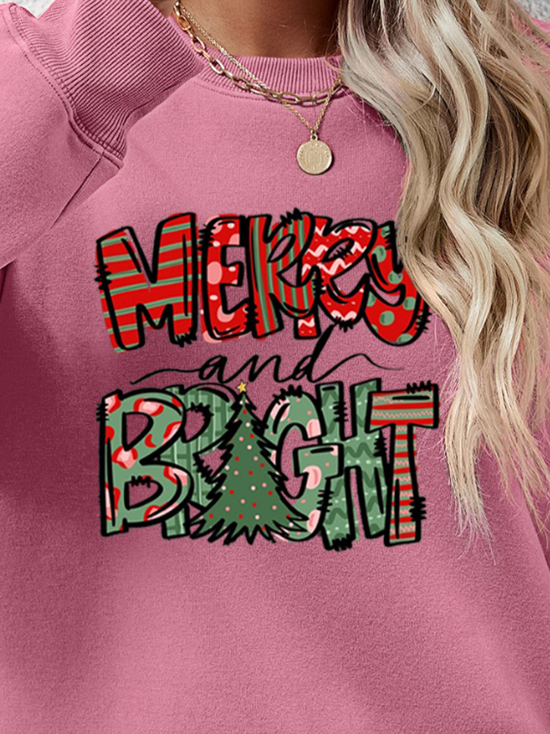 Festive ‘MERRY AND BRIGHT’ long sleeve sweatshirt, perfect for holiday cheer and cozy style.